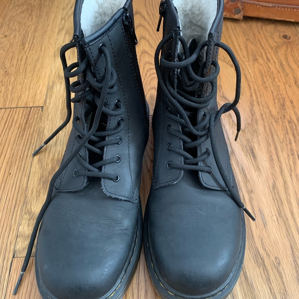 Dr. Martens vegan leather black laced boots.